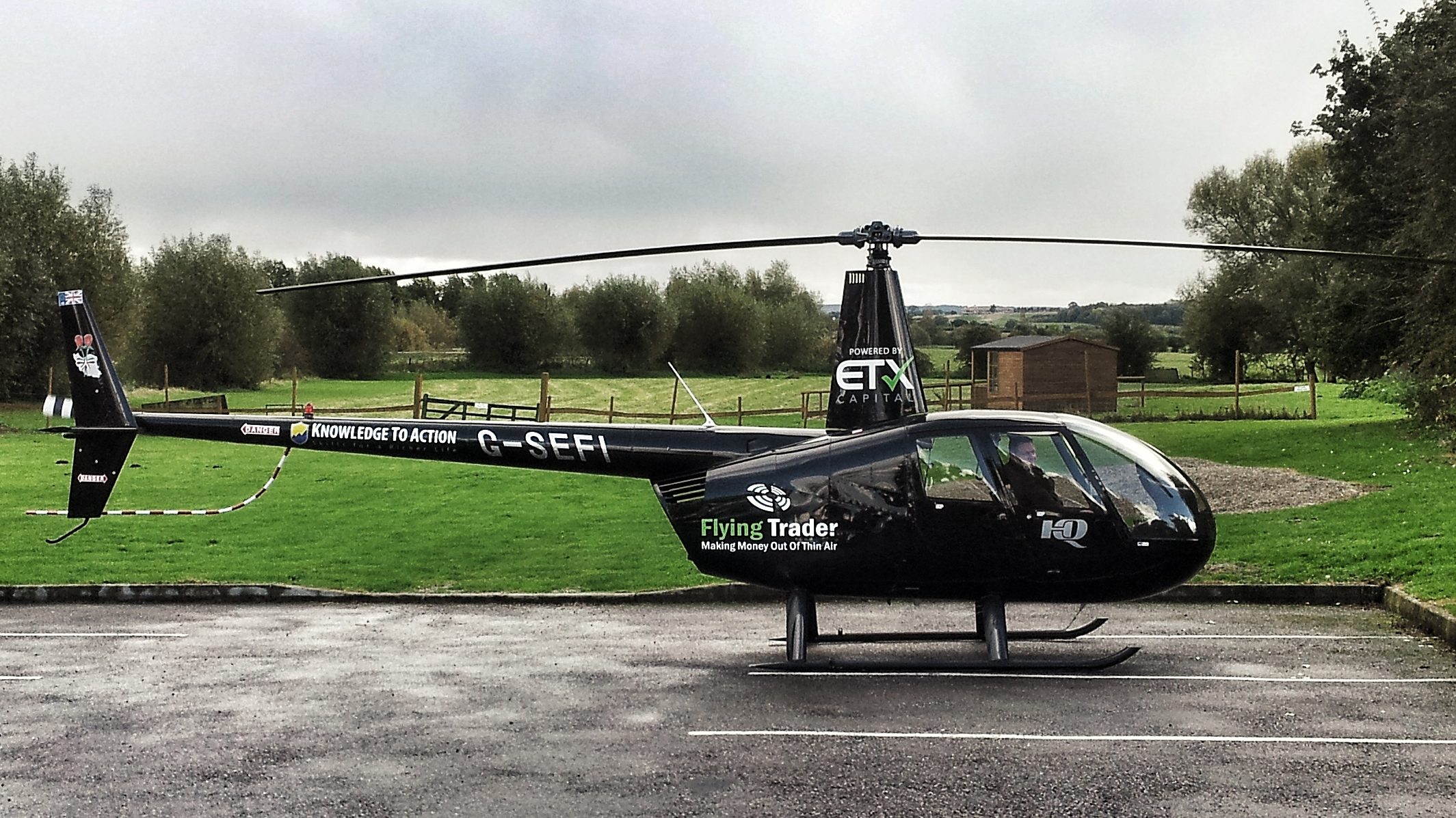 R44 helicopter in car park