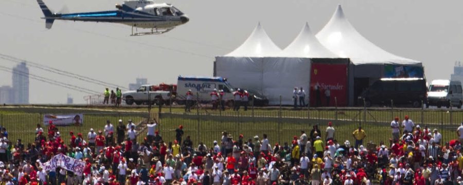 A helicopter carries VIPs to the Brazilian Grand Prix in Sao Paulo in 2010. Politicians taking expensive helicopters and government planes have generated controversy in Brazil.