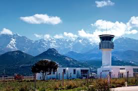 Scenic view of a helipad with tower and mountains, sourced from Helipaddy, ideal for aviation enthusiasts and travelers.
