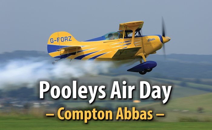 Yellow plane flying at Pooleys Air Day, Compton Abbas. Explore on Helipaddy for more air events.