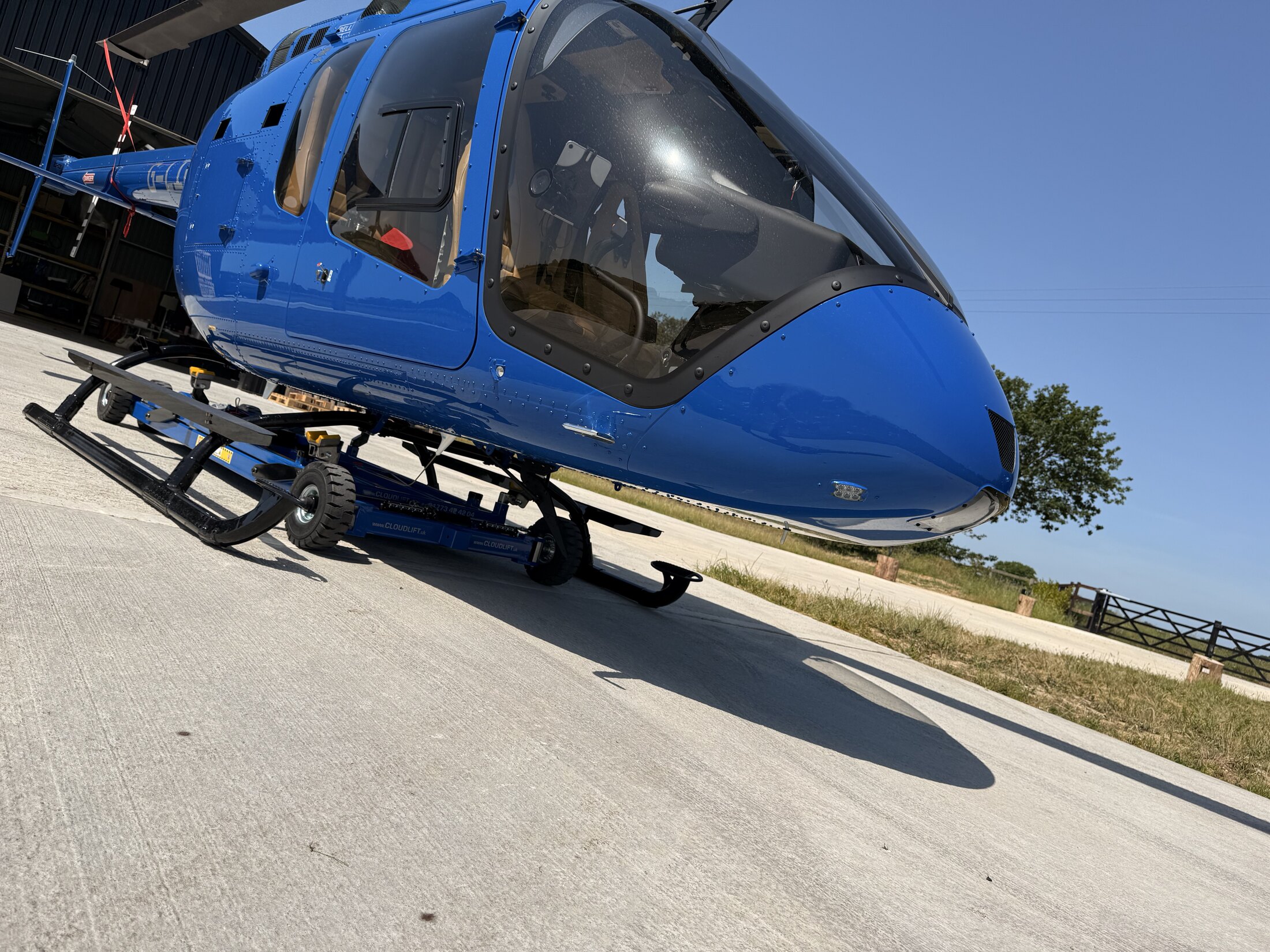 Cloud Lift helimover positioned under the blue Bell 505 G-LILO