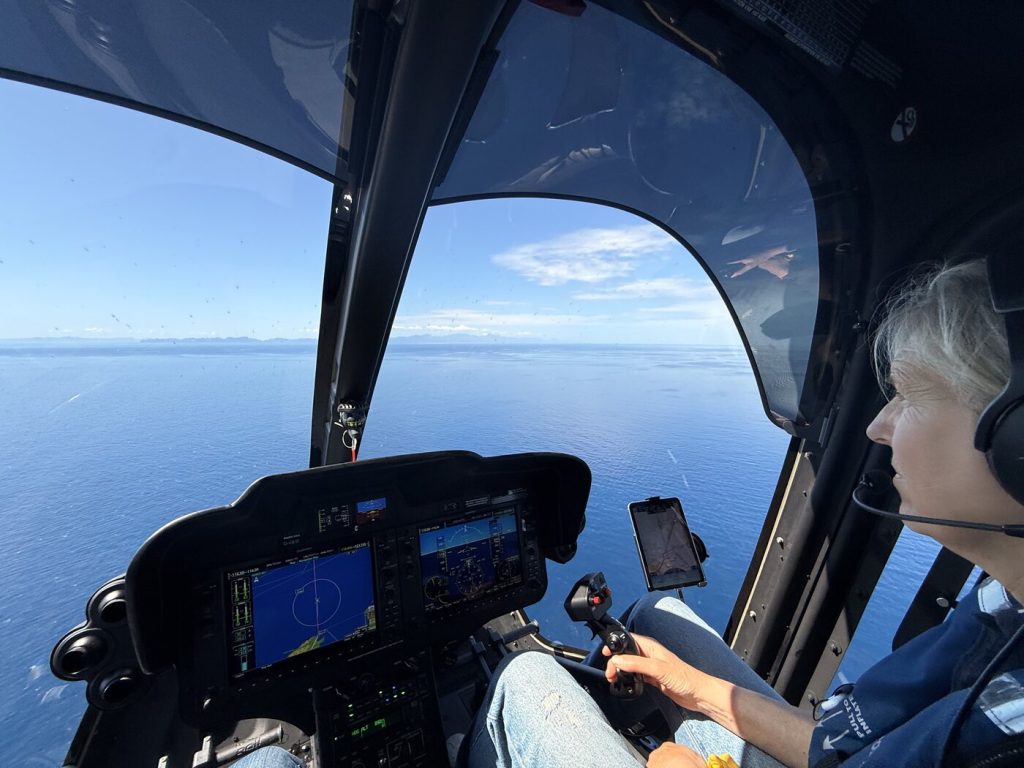 Cockpit view over the sea on the crossing towards Mallorca in Bell 505 G-LILO